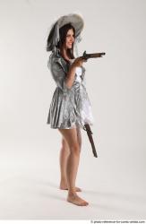 LUCI_AVIOL STANDING POSE WITH TWO GUNS